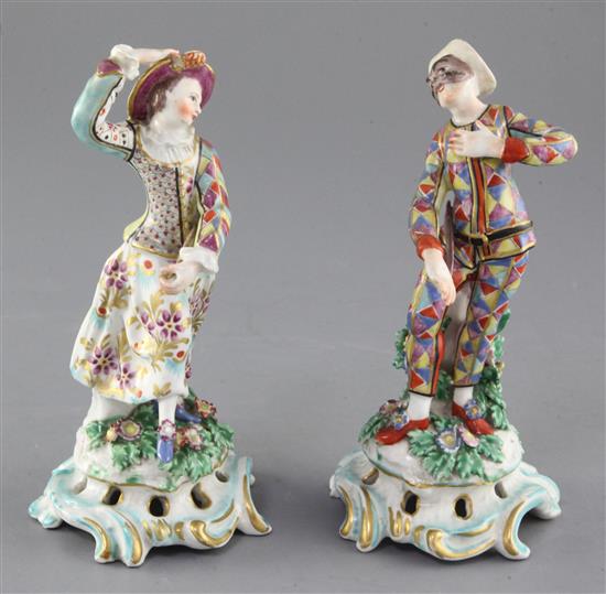 A pair of Bow porcelain figures of Harlequin and Columbine, c.1770, height 18.5cm and 19cm